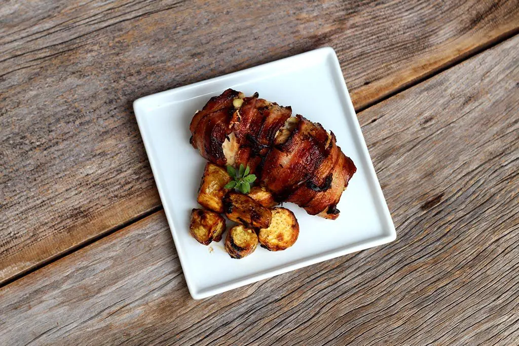 Receita de filé um delicioso de frango com recheio com abobrinha e tomate